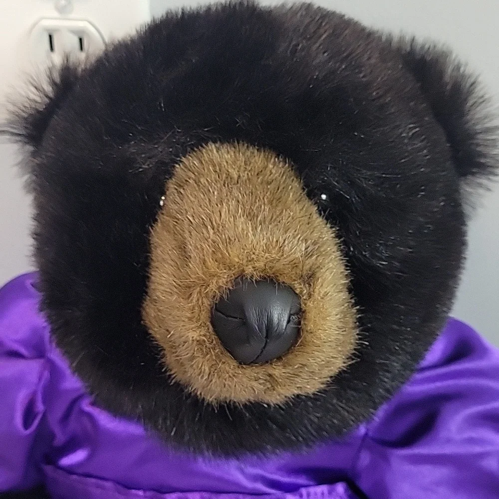 Bronner's Ditz Design Plush Bear wearing pearls and purple dress